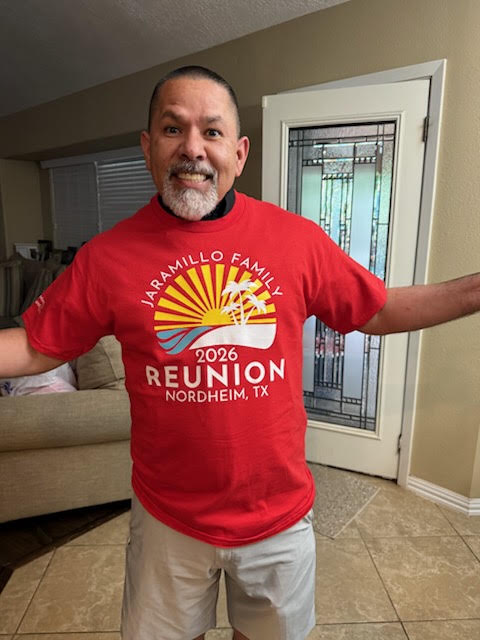 Louis wearing a family reunion shirt