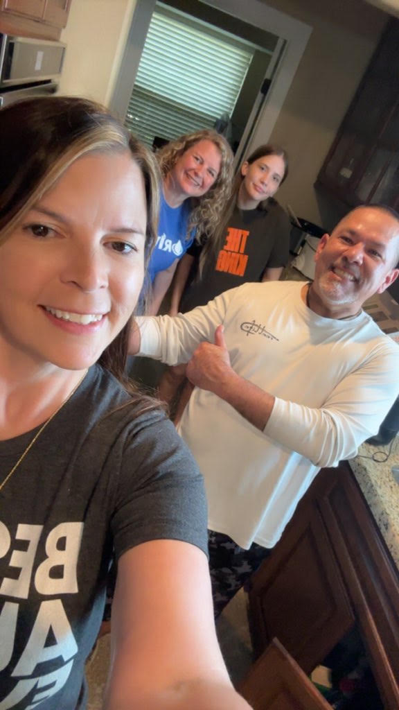 Louis at home with his family